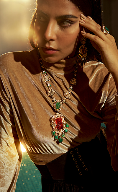 Woman wearing traditional jewelry with a warm glow